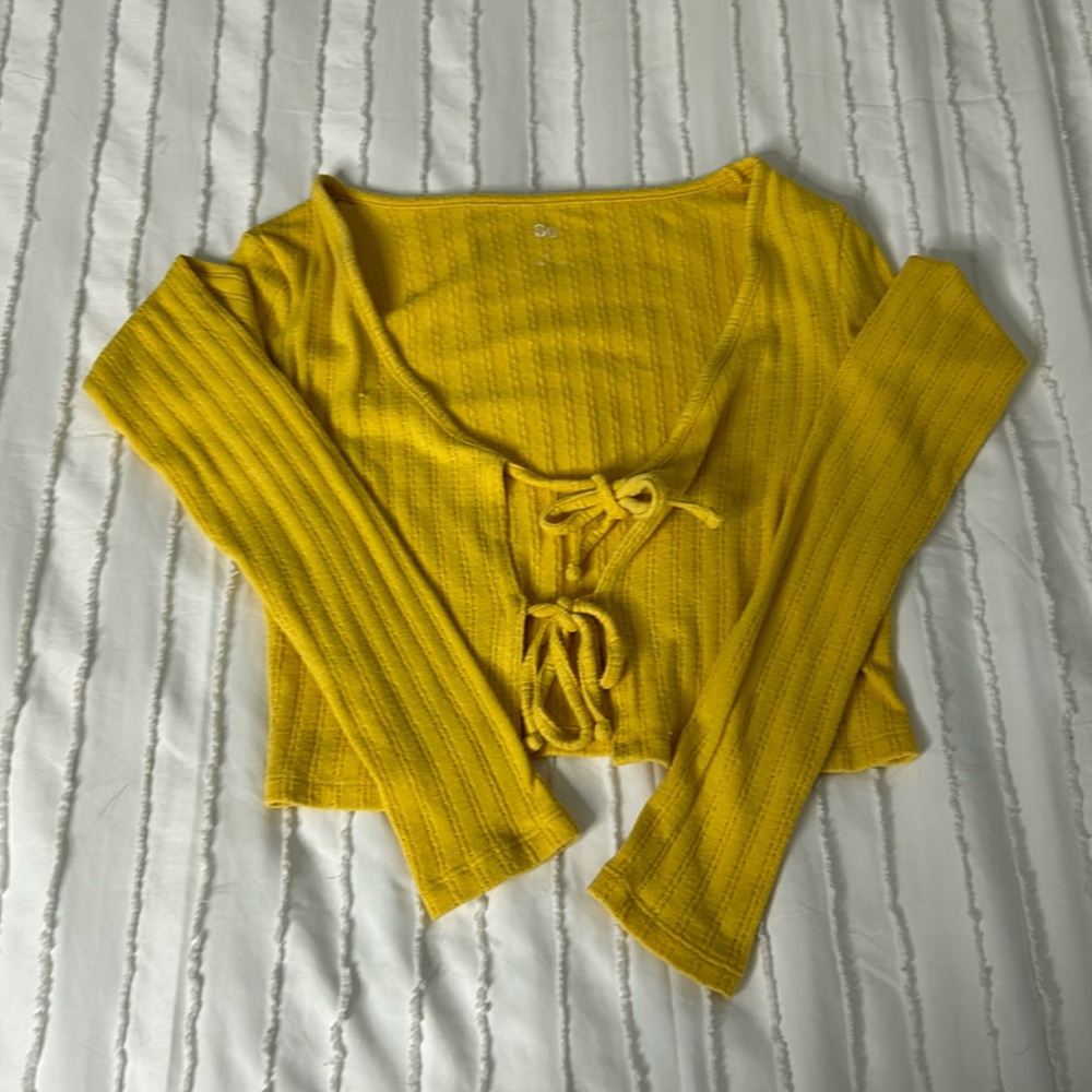 SO long sleeve top with ties in the front. Size XS
